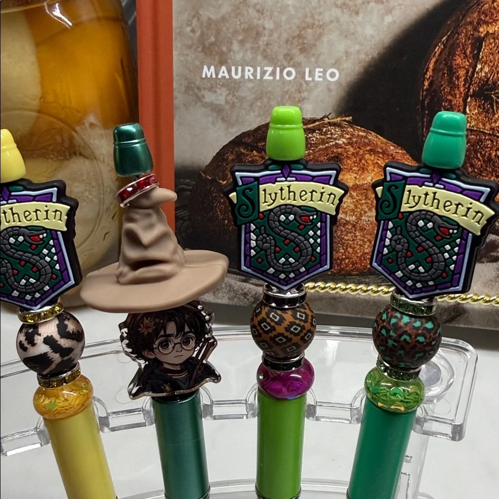 Harry Potter and Slytherin Themed Pens with Charms.
